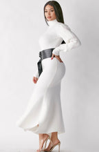Load image into Gallery viewer, Keep cozy in this effortless cashmere turtleneck sweater dress this season. This white turtleneck sweater dress should be in every closet. Featuring a soft ribbed knitted fabric, turtle neck, puff sleeves and a faux leather waist belt. Team this with sexy boots and simple accessories to complete the look.