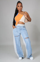 Load image into Gallery viewer, In The Mix Denim Sweatpants. These bottoms are made from a mix of heather grey cotton sweat and light wash denim fabrication. These pants feature distressed rips at the knees, straight leg pants, an elastic waistband, two front and back pockets, and a button detail. Style these with a cropped hoodie and a pair of white sneakers!