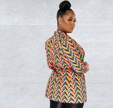 Load image into Gallery viewer, A statement blazer is a must-have this season. It commands attention, and our It's All About You Blazer is the perfect way to achieve just that! The asymmetrical V print design adds a touch of glamour. Featuring a classic collar neckline, button closure wear over our black faux leather leggings and a white bodysuit with pumps, for the perfect statement look!