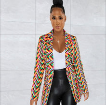 Load image into Gallery viewer, A statement blazer is a must-have this season. It commands attention, and our It's All About You Blazer is the perfect way to achieve just that! The asymmetrical V print design adds a touch of glamour. Featuring a classic collar neckline, button closure wear over our black faux leather leggings and a white bodysuit with pumps, for the perfect statement look!