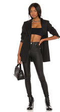 Load image into Gallery viewer, Flex your style in these cute Lex Skinny Wax Coated Denim Black Jeans the liquid wax coating design gives these jeans a chic look. Perfect for styling any and every way you want! These jeans come in a high rise fit featuring 5 pocket, zip and button closure. You can pair these with our black crop tank top, and chic fashion blazer or a graphic tee and high heels or combat boots and of course a handbag for a complete look!