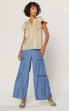 Load image into Gallery viewer, We're bringing the good life vibes to you! This is a pretty special design the detailing golden sparkle fabric and feminine puff pleated wide sleeves at the shoulders, and a sexy V pleated neckline. This Beautiful design is classic, pair with denim jeans shorts, a nude high heel mule, gold accessories, and statement bag for a complete look and you'll be ready to get your day or night started!