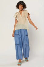 Load image into Gallery viewer, We're bringing the good life vibes to you! This is a pretty special design the detailing golden sparkle fabric and feminine puff pleated wide sleeves at the shoulders, and a sexy V pleated neckline. This Beautiful design is classic, pair with denim jeans shorts, a nude high heel mule, gold accessories, and statement bag for a complete look and you'll be ready to get your day or night started!