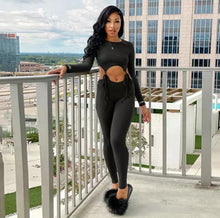 Load image into Gallery viewer, Show off those sexy curves this summer girl! Great for a night out! This jumpsuit features a ribbed material, long sleeve, round neckline and design. Pair this with a simple flat to keep it casual or a chic high heel and handbag for a spiced up look we love!