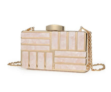 Load image into Gallery viewer, This marble acrylic clutch is elegant, glamorous and fashionable. A stylish and convenient addition to your accessory collection. With room for all your must-have gizmos, this rectangular purse has a removable crossbody strap and gold hardware. Great present for your friend, your family or yourself. This unique & beautiful design will make you shine.