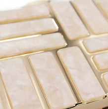 Load image into Gallery viewer, This marble acrylic clutch is elegant, glamorous and fashionable. A stylish and convenient addition to your accessory collection. With room for all your must-have gizmos, this rectangular purse has a removable crossbody strap and gold hardware. Great present for your friend, your family or yourself. This unique & beautiful design will make you shine.