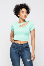 Load image into Gallery viewer, Crop tops are essential in every girls wardrobe and we're obsessing over our vibrant mint crop top. Featuring a stretch kitted material with short sleeves and a round neckline, and a cut-out detailing which exposes the skin for a real statement-making look. Pair with your favorite blue wash denim jeans or with cargos and high heels to complete the look