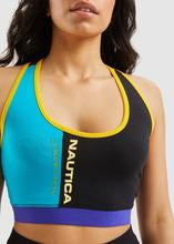 Load image into Gallery viewer, Nautica Viola Bra Top - Black This statement bra top is the perfect addition to your Spring, Summer wardrobe. With bright block colors and contrasting branding you can be sure to chill in style.