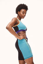 Load image into Gallery viewer, Nautica Viola Bra Top - Black This statement bra top is the perfect addition to your Spring, Summer wardrobe. With bright block colors and contrasting branding you can be sure to chill in style.