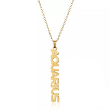 Load image into Gallery viewer, This Aquarius necklace is perfect for any outfit, you can also layer it with your favorite necklaces to create a unique style! Each sign of the Zodiac has its own symbol and a Cubic Zirconia finish for the constellation. You'll have heads turning, living glam, and feeling iconic with this vertical design.