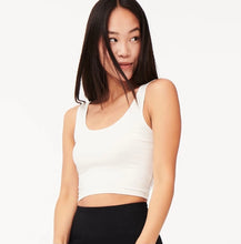 Load image into Gallery viewer, Add just the right touch of edge to your look with this sexy cami crop top. Featuring a round neckline, our thick tank straps and a cropped fit. Pair with our faux leather leggings or our "Hybrid Dream Jeans", high heels and statement handbag for a complete look we're loving.