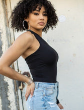 Load image into Gallery viewer, We're bringing you the ultimate crossover bodysuit! Perfect for building your favorite looks all year round. This bodysuit comes in a luxurious milky smooth soft fabric it is also wrinkle free. Our sexy crossover bodysuit featuring a sexy neckline, cut out back and snap seat closure. Made of materials that allow great stretch and breathable fabric. Style it with a blazer and jeans or one of our sexy pleated skirts matching high waist legging and heels to create a casual-chic look.