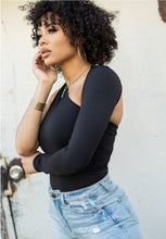 Load image into Gallery viewer, We're bringing you the ultimate crossover bodysuit! Perfect for building your favorite looks all year round. This bodysuit comes in a luxurious milky smooth soft fabric it is also wrinkle free. Our sexy crossover bodysuit featuring a sexy neckline, cut out back and snap seat closure. Made of materials that allow great stretch and breathable fabric. Style it with a blazer and jeans or one of our sexy pleated skirts matching high waist legging and heels to create a casual-chic look.