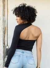 Load image into Gallery viewer, We're bringing you the ultimate crossover bodysuit! Perfect for building your favorite looks all year round. This bodysuit comes in a luxurious milky smooth soft fabric it is also wrinkle free. Our sexy crossover bodysuit featuring a sexy neckline, cut out back and snap seat closure. Made of materials that allow great stretch and breathable fabric. Style it with a blazer and jeans or one of our sexy pleated skirts matching high waist legging and heels to create a casual-chic look.