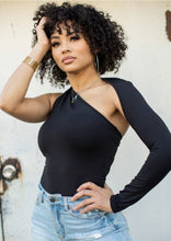 Load image into Gallery viewer, We're bringing you the ultimate crossover bodysuit! Perfect for building your favorite looks all year round. This bodysuit comes in a luxurious milky smooth soft fabric it is also wrinkle free. Our sexy crossover bodysuit featuring a sexy neckline, cut out back and snap seat closure. Made of materials that allow great stretch and breathable fabric. Style it with a blazer and jeans or one of our sexy pleated skirts matching high waist legging and heels to create a casual-chic look.