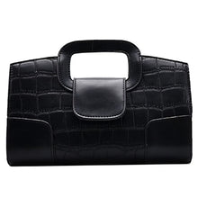 Load image into Gallery viewer, Finish off your evening look with this classy handbag babe. Featuring a black faux leather material, and this bag comes with a crossbody strap, a gold link strap for the shoulder, front flap design and a metal popper fastening. Style with any of your night time looks!