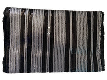 Load image into Gallery viewer, After looking high and low, traveling far and wide, our journey finally brought us to Night Life Sequin Clutch! This cute black clutch features rows of stunning black and silver sequin, and black fringe. Lift the top from the hidden magnetic closure to find a striped, lined interior with a sidewall pocket. Detachable chain strap.
