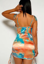 Load image into Gallery viewer, This elegant dress is made from a satin fabrication, and is complete with a ruched sides, silk bodycon, and a hidden back zipper. Style this dress for a lady's night out with a pair of pointed toe stilettos and a cropped denim jacket!