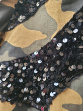 Load image into Gallery viewer, We're in love with this sexy and sophisticated Camo jacket features red checkered material, V-neck collar with accent black sequence sparkles, long sleeves along with belt to tie in front. This Woven print Jacket is easy to style and made of very lightweight material. This coat comes fully lined with a zipper detailing. Pair this with faux leather pants or jeans, a fabulous top and stylish heels or any of your favorite fall looks!