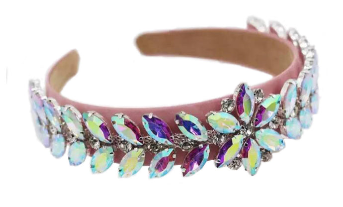 The pretty in pink crystal headband is beautiful and elegant. Iridescent rhinestones. Wear with a luxurious white dress or your favorite jeans and crop top. It always looks perfect. Is extremely comfortable and this headband makes a glamorous statement piece.