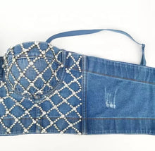 Load image into Gallery viewer, Do the most in this trendy blue jean crystal denim bustier crop top! This destructed beautiful rhinestone-embellished denim bustier bra features a rhinestone detailed pattern, sweetheart neckline, adjustable, detachable shoulder straps, a row of hidden hook back closures, and built-in padded bra.
