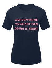 Load image into Gallery viewer, Make this cute graphic T apart your wardrobe because you're the trendsetter babe! This top adds the perfect touch to any outfit you want to make not-so-simple. Featuring a crew neck, short sleeves, and soft fabric. Style with a pair of leggings and heels for a complete look.