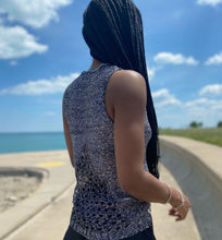 Load image into Gallery viewer, Feel cute and cozy, with this Shine Bright knitted camisole sweater will get the job done. Featuring a soft and stretchy sequin knitted fabric and sleeveless. Style with our "Swing It Baby Shorts" or jeans and high heels for a complete look.