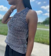 Load image into Gallery viewer, Feel cute and cozy, with this Shine Bright knitted camisole sweater will get the job done. Featuring a soft and stretchy sequin knitted fabric and sleeveless. Style with our "Swing It Baby Shorts" or jeans and high heels for a complete look.