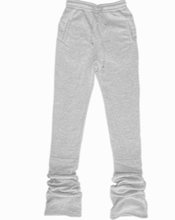 Load image into Gallery viewer, High Waisted Stacked Sweatpants - Heather Grey Upgrade your casual look this season with these stacked sweatpants. These sweatpants come different colors. Featuring elastic waist band and two deep side pockets, drawstring for a comfortable stretch. You can style with a simple bodysuit or T- Shirt to complete the look.