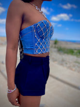 Load image into Gallery viewer, We're bringing the heat with these flowy swing it baby shorts! Great for day parties with your girls or even a night out with your bae! These shorts come in a soft black material, front zip and button closure. Style these sexy shorts with a white bodysuit or a rhinestone denim corset, simple high heels and handbag for a complete look!