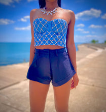 Load image into Gallery viewer, We're bringing the heat with these flowy swing it baby shorts! Great for day parties with your girls or even a night out with your bae! These shorts come in a soft black material, front zip and button closure. Style these sexy shorts with a white bodysuit or a rhinestone denim corset, simple high heels and handbag for a complete look!