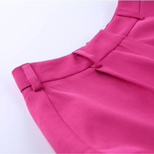 Load image into Gallery viewer, We're bringing the heat with these flowy swing it baby shorts! Great for day parties with your girls or even a night out with your bae! These shorts come in a soft hot pink material, front zip and button closure. Style these sexy shorts with a white bodysuit or a rhinestone denim corset, simple high heels and handbag for a complete look!