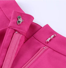 Load image into Gallery viewer, We're bringing the heat with these flowy swing it baby shorts! Great for day parties with your girls or even a night out with your bae! These shorts come in a soft hot pink material, front zip and button closure. Style these sexy shorts with a white bodysuit or a rhinestone denim corset, simple high heels and handbag for a complete look!