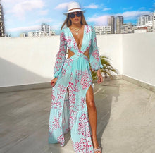 Load image into Gallery viewer, Our Sexy Te amo Turquoise and coral Maxi Dress never goes out of style. It has a deep v-neckline, Diamond shaped torso cut-out out shows just the right amount of skin. Flowing A-line skirt with two high side slits. Elastic waistband with a buckle for the perfect fit. Pair with a sexy strapped neutral or clear high heels and a cute handbag for a sexy and flirty look! Bodysuit attached.