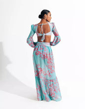 Load image into Gallery viewer, Our Sexy Te amo Turquoise and coral Maxi Dress never goes out of style. It has a deep v-neckline, Diamond shaped torso cut-out out shows just the right amount of skin. Flowing A-line skirt with two high side slits. Elastic waistband with a buckle for the perfect fit. Pair with a sexy strapped neutral or clear high heels and a cute handbag for a sexy and flirty look! Bodysuit attached.