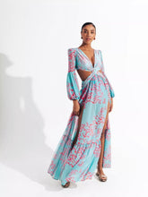 Load image into Gallery viewer, Our Sexy Te amo Turquoise and coral Maxi Dress never goes out of style. It has a deep v-neckline, Diamond shaped torso cut-out out shows just the right amount of skin. Flowing A-line skirt with two high side slits. Elastic waistband with a buckle for the perfect fit. Pair with a sexy strapped neutral or clear high heels and a cute handbag for a sexy and flirty look! Bodysuit attached.