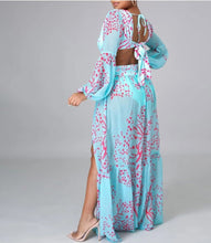 Load image into Gallery viewer, Our Sexy Te amo Turquoise and coral Maxi Dress never goes out of style. It has a deep v-neckline, Diamond shaped torso cut-out out shows just the right amount of skin. Flowing A-line skirt with two high side slits. Elastic waistband with a buckle for the perfect fit. Pair with a sexy strapped neutral or clear high heels and a cute handbag for a sexy and flirty look! Bodysuit attached.