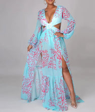 Load image into Gallery viewer, Our Sexy Te amo Turquoise and coral Maxi Dress never goes out of style. It has a deep v-neckline, Diamond shaped torso cut-out out shows just the right amount of skin. Flowing A-line skirt with two high side slits. Elastic waistband with a buckle for the perfect fit. Pair with a sexy strapped neutral or clear high heels and a cute handbag for a sexy and flirty look! Bodysuit attached.
