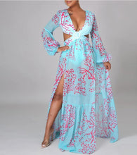 Load image into Gallery viewer, Our Sexy Te amo Turquoise and coral Maxi Dress never goes out of style. It has a deep v-neckline, Diamond shaped torso cut-out out shows just the right amount of skin. Flowing A-line skirt with two high side slits. Elastic waistband with a buckle for the perfect fit. Pair with a sexy strapped neutral or clear high heels and a cute handbag for a sexy and flirty look! Bodysuit attached.