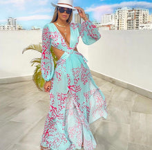 Load image into Gallery viewer, Our Sexy Te amo Turquoise and coral Maxi Dress never goes out of style. It has a deep v-neckline, Diamond shaped torso cut-out out shows just the right amount of skin. Flowing A-line skirt with two high side slits. Elastic waistband with a buckle for the perfect fit. Pair with a sexy strapped neutral or clear high heels and a cute handbag for a sexy and flirty look! Bodysuit attached.