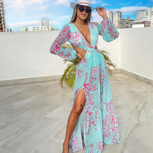 Load image into Gallery viewer, Our Sexy Te amo Turquoise and coral Maxi Dress never goes out of style. It has a deep v-neckline, Diamond shaped torso cut-out out shows just the right amount of skin. Flowing A-line skirt with two high side slits. Elastic waistband with a buckle for the perfect fit. Pair with a sexy strapped neutral or clear high heels and a cute handbag for a sexy and flirty look! Bodysuit attached.