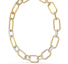 Load image into Gallery viewer, A celebration of femininity and modern design, this Swarovski necklace draws inspiration from the hardware trend. Two elongated chain links holding onto each other – one shimmering softly, one covered in clear crystal pavé – take center stage.