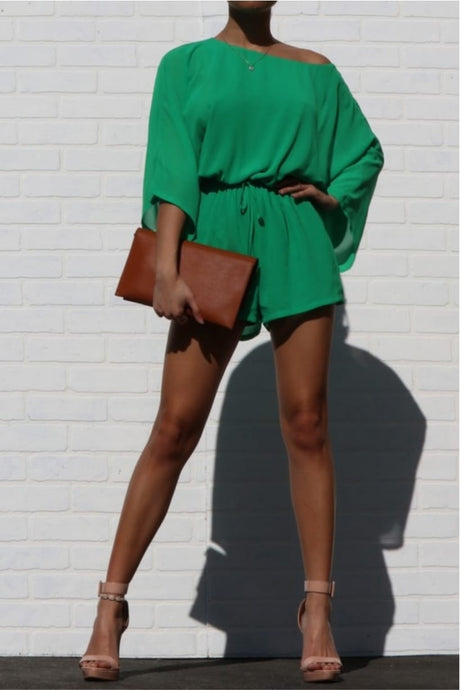 This Money Bag romper is a must have for the new season babe! Easy to style and perfect for multiple occasions. This romper comes fully lined in a green mesh material and elasticized waistband. Style with a high heel, gold accessories and woven clutch bag for a weekend look you'll adore.