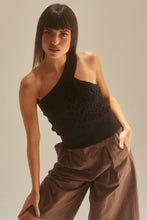 Load image into Gallery viewer, Get in touch with your wardrobe this season with this cute kitted sweater. Featuring a black hue twisted cable knit material with a cropped fit, asymmetrical shoulder cut-out adds a flirty touch. It's super soft with the right amount of stretch we're in love. Pair this with your favorite high rise denim jeans, high heels or boots and gold hoop earrings for an effortless vibe.