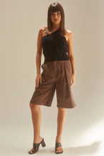 Load image into Gallery viewer, Get in touch with your wardrobe this season with this cute kitted sweater. Featuring a black hue twisted cable knit material with a cropped fit, asymmetrical shoulder cut-out adds a flirty touch. It's super soft with the right amount of stretch we're in love. Pair this with your favorite high rise denim jeans, high heels or boots and gold hoop earrings for an effortless vibe.