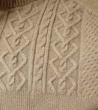 Load image into Gallery viewer, Get in touch with your wardrobe this season with this cute knitted sweater. Featuring a moss green hue twisted cable knit material with a cropped fit, asymmetrical shoulder cut-out adds a flirty touch. It's super soft with the right amount of stretch we're in love. Pair this with your favorite high rise denim jeans, high heels or boots and gold hoop earrings for an effortless vibe.