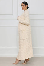 Load image into Gallery viewer, Embrace your cozy & stylish side, a piece that will have you looking and feeling great. Made with the highest quality material, this sweater has a stretchy and soft feel to it. This sweater pairs well with denim, and also provides a unique look when worn with leggings or pants. Pair with pumps and gold accessories for a chic look or jazz it up with flats and hoops during the day!