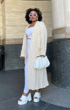 Load image into Gallery viewer, Embrace your cozy & stylish side, a piece that will have you looking and feeling great. Made with the highest quality material, this sweater has a stretchy and soft feel to it. This sweater pairs well with denim, and also provides a unique look when worn with leggings or pants. Pair with pumps and gold accessories for a chic look or jazz it up with flats and hoops during the day!