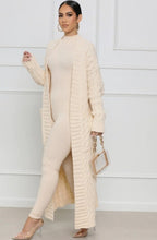 Load image into Gallery viewer, Embrace your cozy & stylish side, a piece that will have you looking and feeling great. Made with the highest quality material, this sweater has a stretchy and soft feel to it. This sweater pairs well with denim, and also provides a unique look when worn with leggings or pants. Pair with pumps and gold accessories for a chic look or jazz it up with flats and hoops during the day!