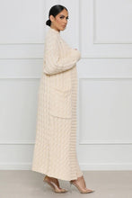 Load image into Gallery viewer, Embrace your cozy & stylish side, a piece that will have you looking and feeling great. Made with the highest quality material, this sweater has a stretchy and soft feel to it. This sweater pairs well with denim, and also provides a unique look when worn with leggings or pants. Pair with pumps and gold accessories for a chic look or jazz it up with flats and hoops during the day!